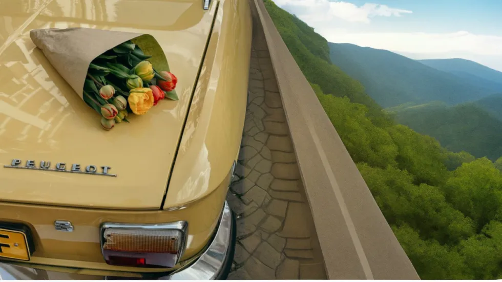 yellow car with flowers driving on a mountain
